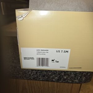 Michael Kors Lexi Sneaker in Black and White